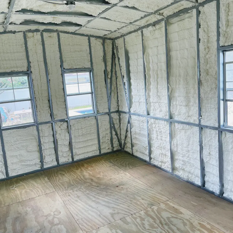 Closed-cell spray foam insulation applied to wall cavities in a residential project in Broken Arrow